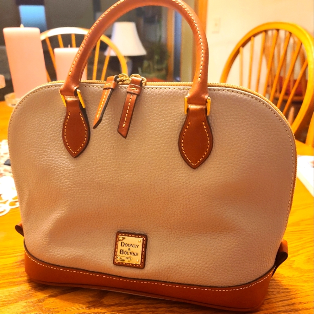 Dooney and Bourke Pebble Leather zip zip handbag with matching wallet.